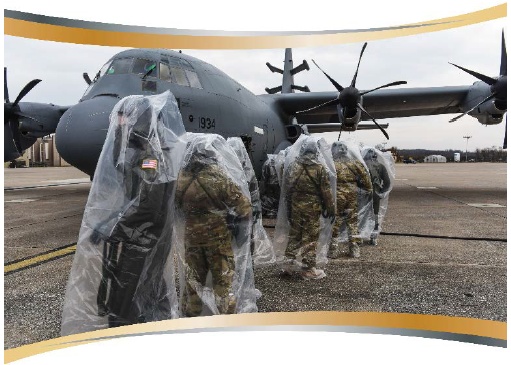 U.S. Airmen prepare to board an EC-130J Commando Solo aircraft